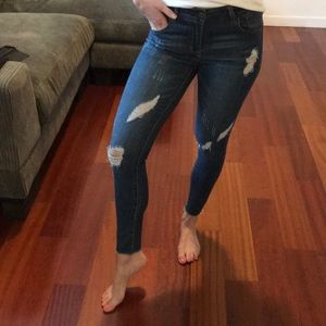 Distressed ankle jeans